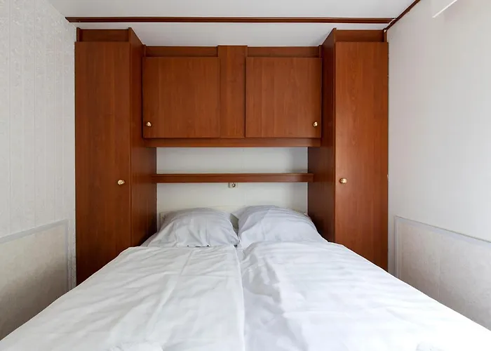 Σαλέ 80, Midden In De - Airco!